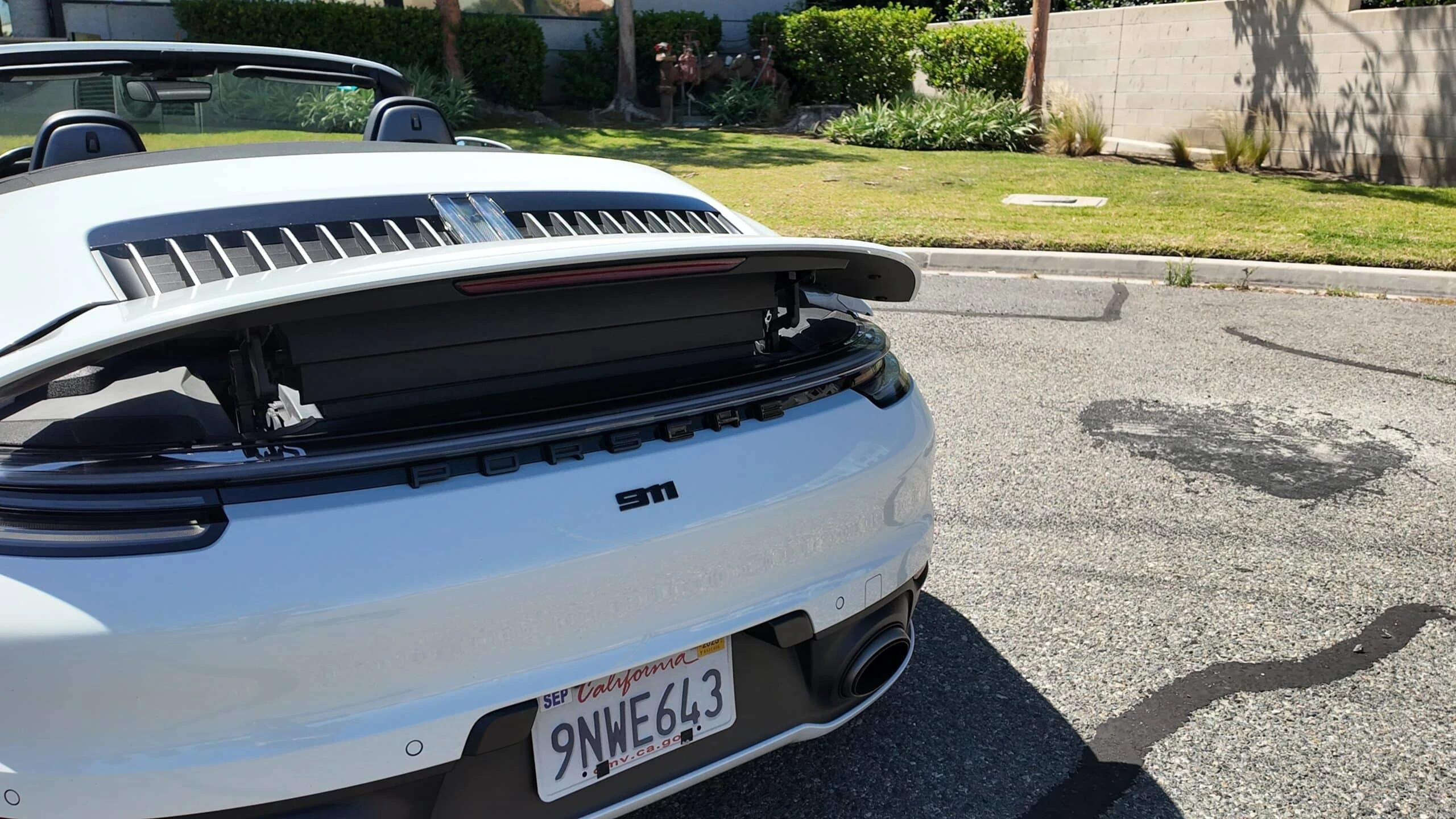 Porsche 911 Carrera 4S Cabriolet detail relevant to all-wheel-drive performance car rentals on LUXURY CAR RENT / US